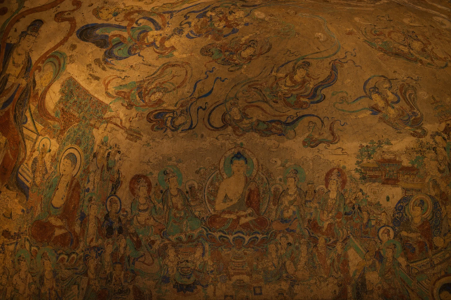 Tang-era Mogao cave mural — flying apsaras and bodhisattvas in mineral pigment colors