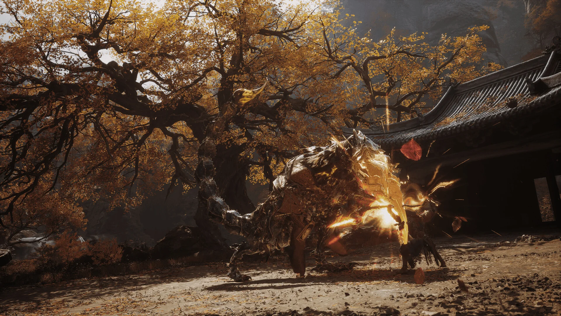 Black Myth: Wukong — in-game screenshot: the Destined One striking a scorpion-like boss amid golden autumn foliage