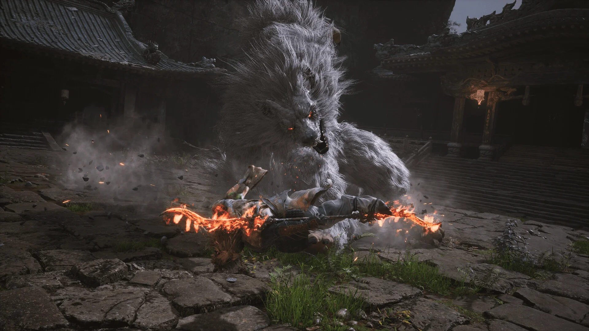 Black Myth: Wukong — in-game environment screenshot of a temple courtyard with traditional Chinese architecture during a wolf-guai boss fight