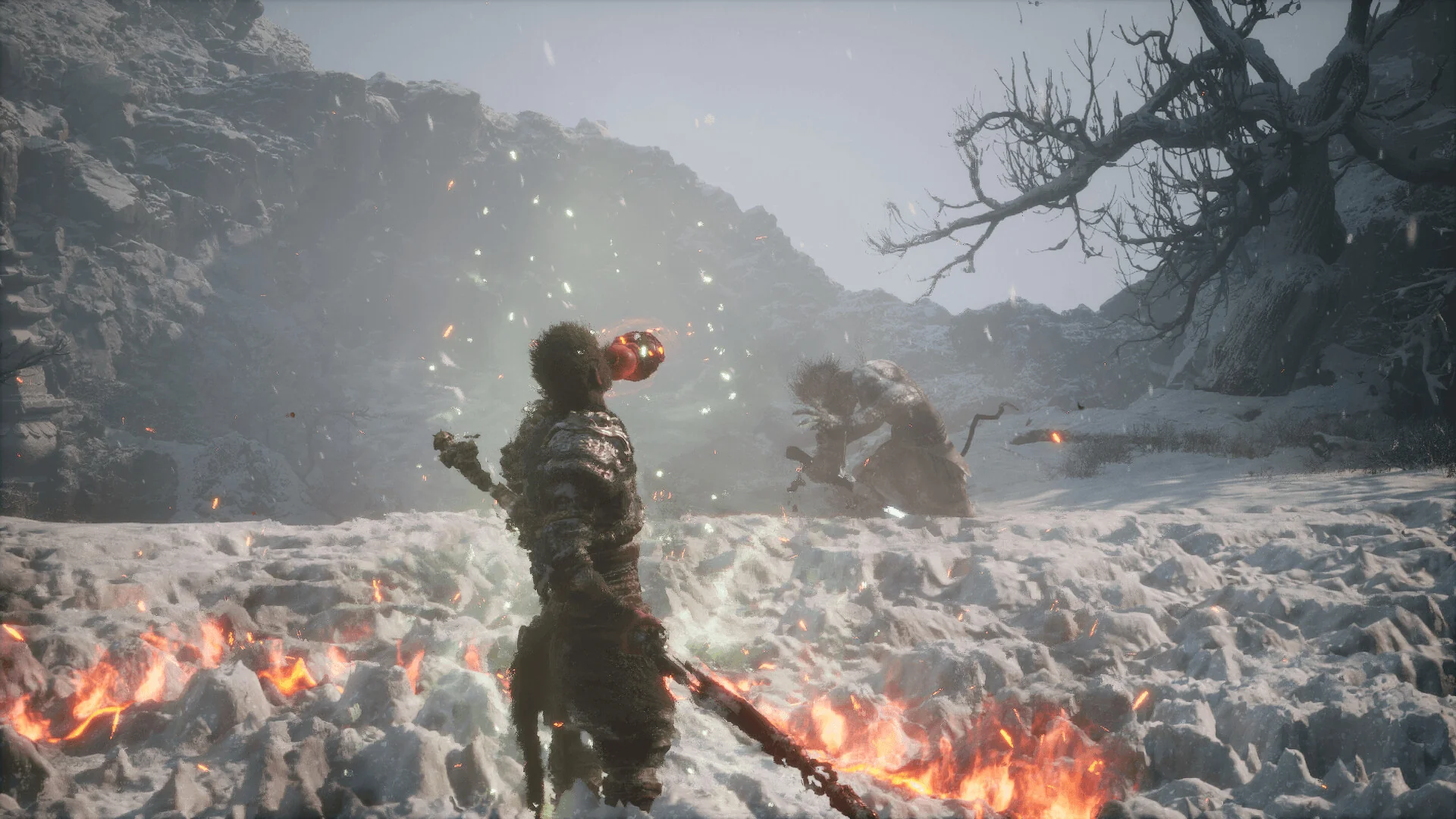 Black Myth: Wukong — in-game snowy mountain vista with distant cliffs and mist, illustrating wide draw distance on PC and console