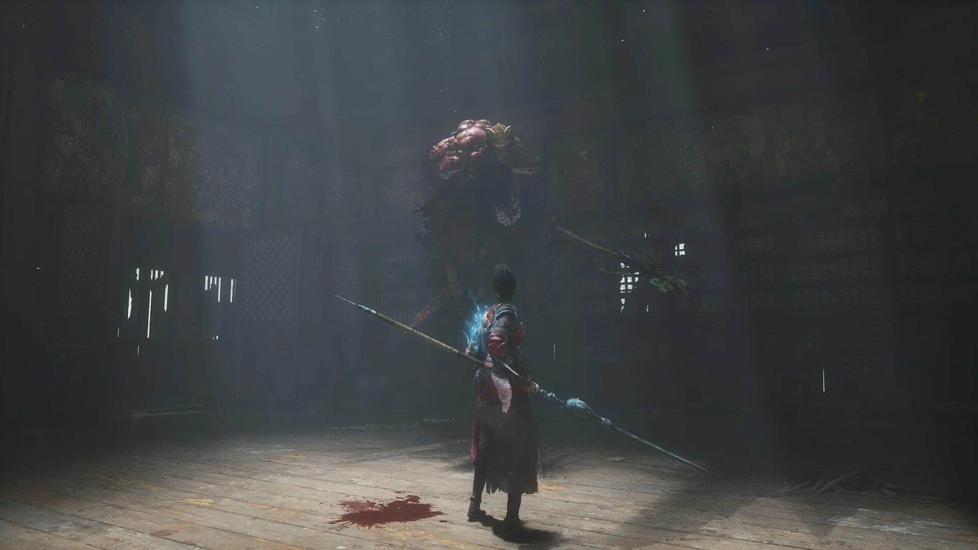 WUCHANG: Fallen Feathers — in-game boss encounter screenshot in a dim hall with blood on the floor and a towering mutated foe